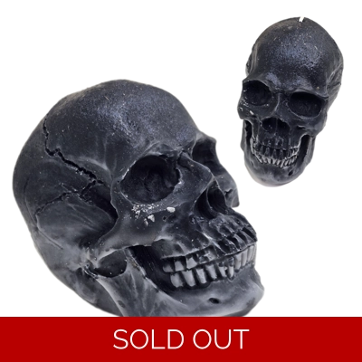 Big Decorative Pillar Candle Skull Old Rock On the Pathway Gray